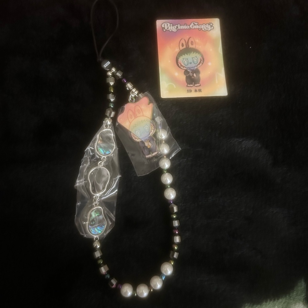 Big into energy secret ID phone charm